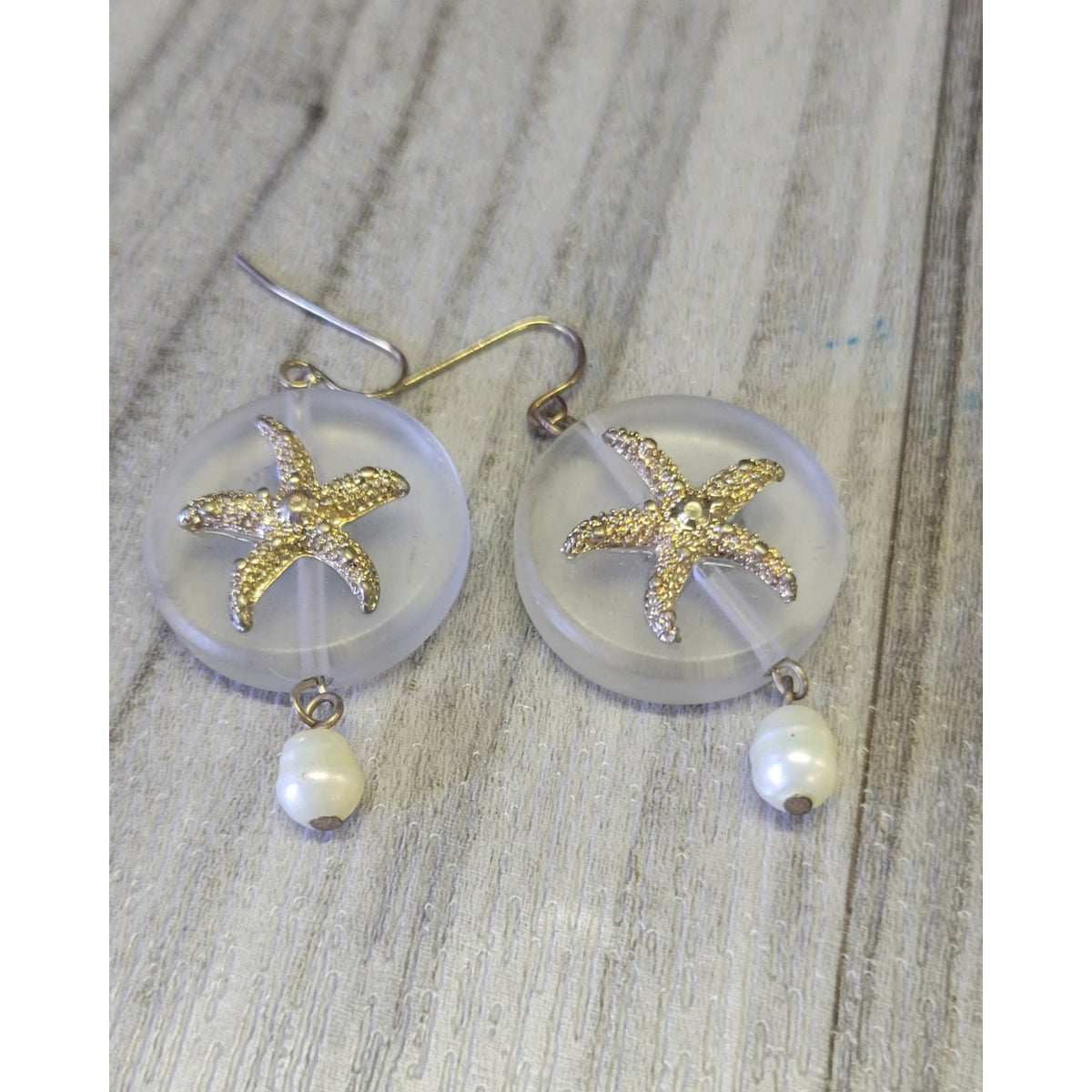 Starfish dangle earrings with cute pearl