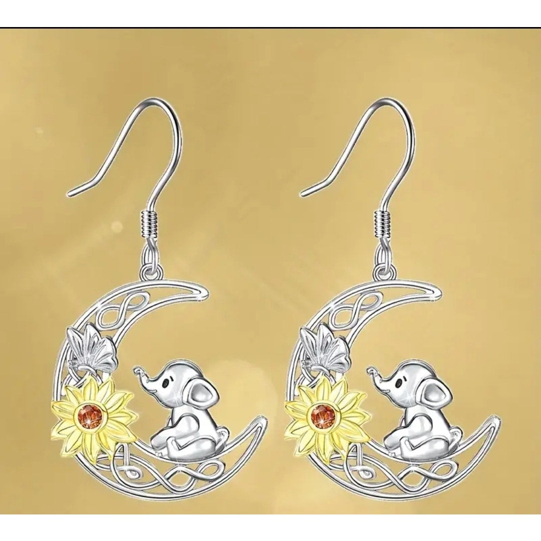 Elephant sitting on moon with sun earrings