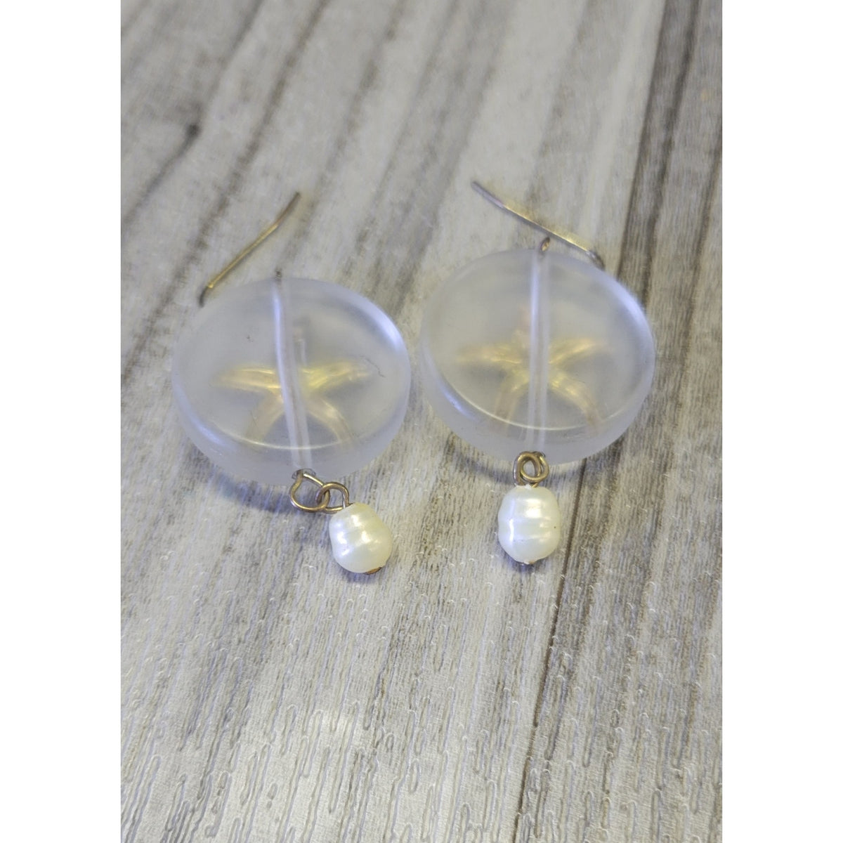 Starfish dangle earrings with cute pearl
