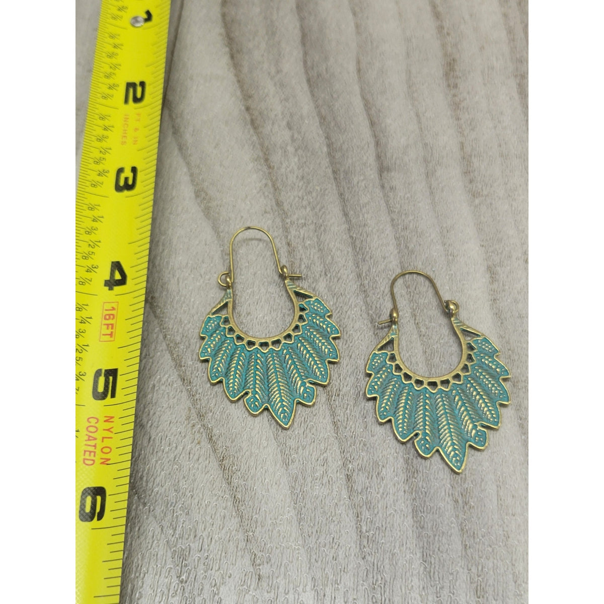 Metal distressed turquoise feathers earrings